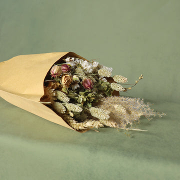 deliate beige bouquet with few pink roses