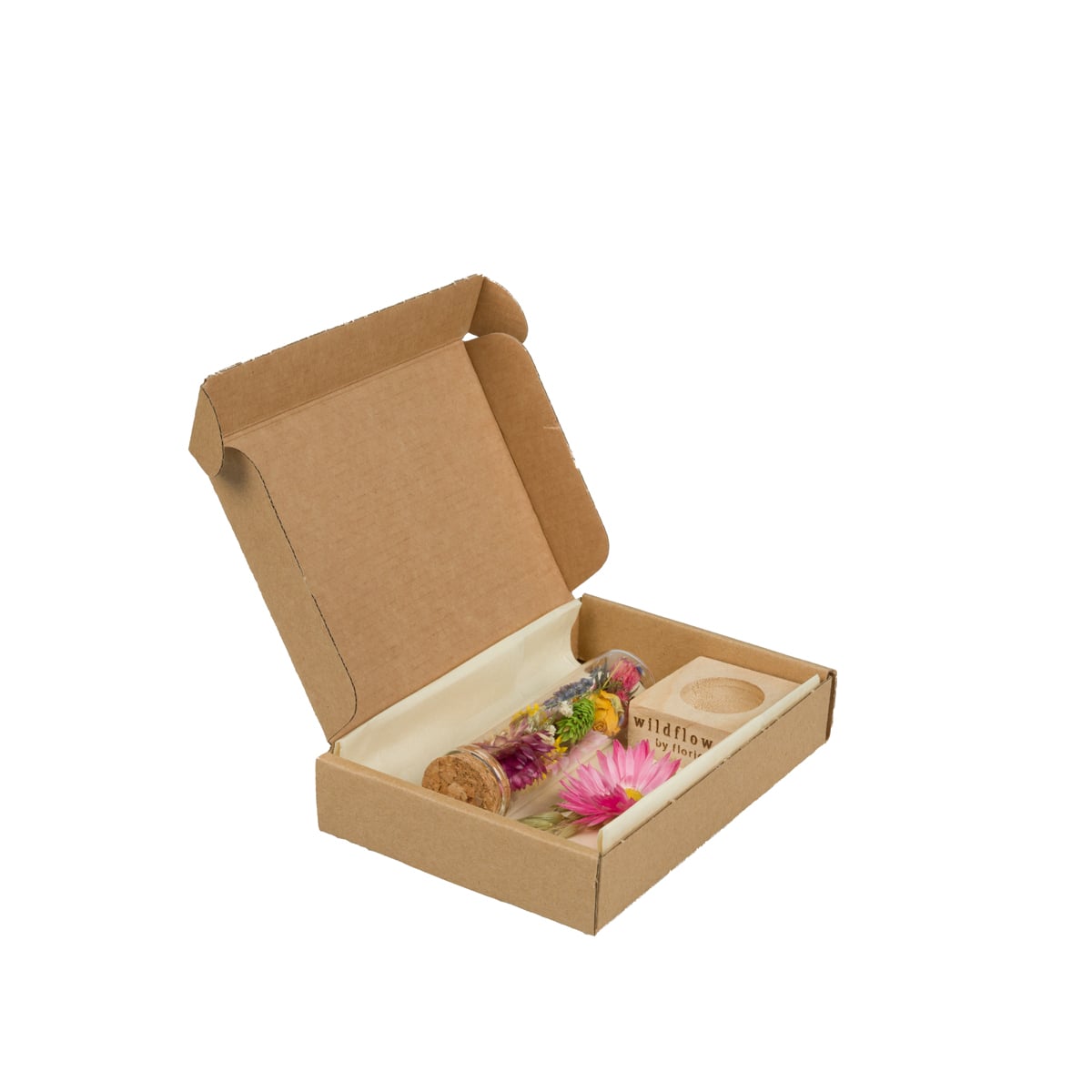 Open cardboard box with small dried flowers on a white background