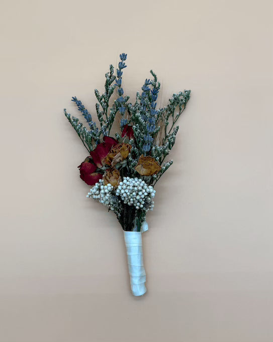 Bouquet of flowers with a white base on a beige background