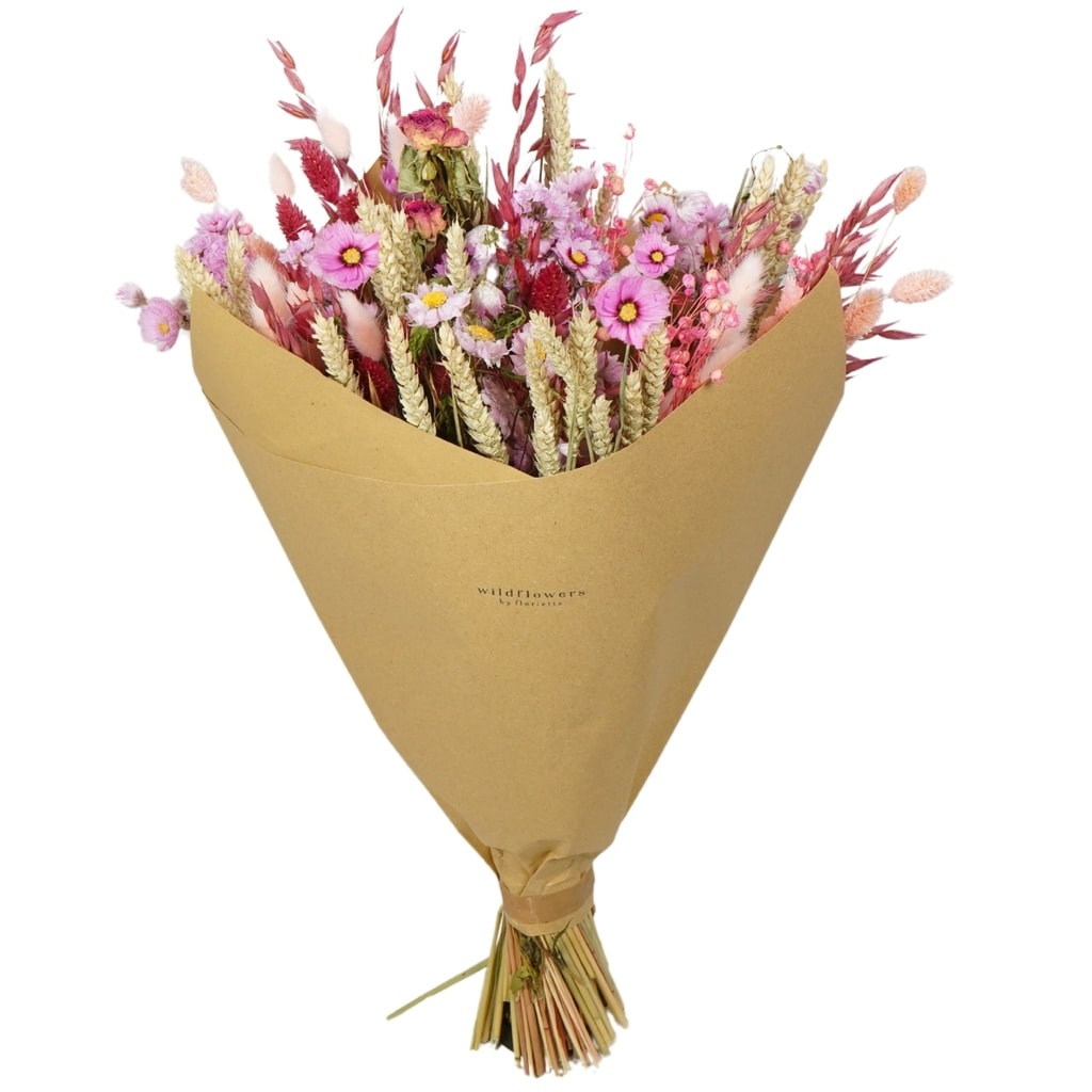 Bouquet of flowers wrapped in brown paper on a white background