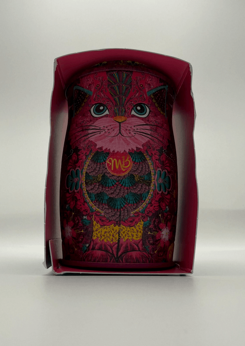 Monty Bojangles cat-shaped chocolate truffles tin with colourful decorative cat design in red and teal