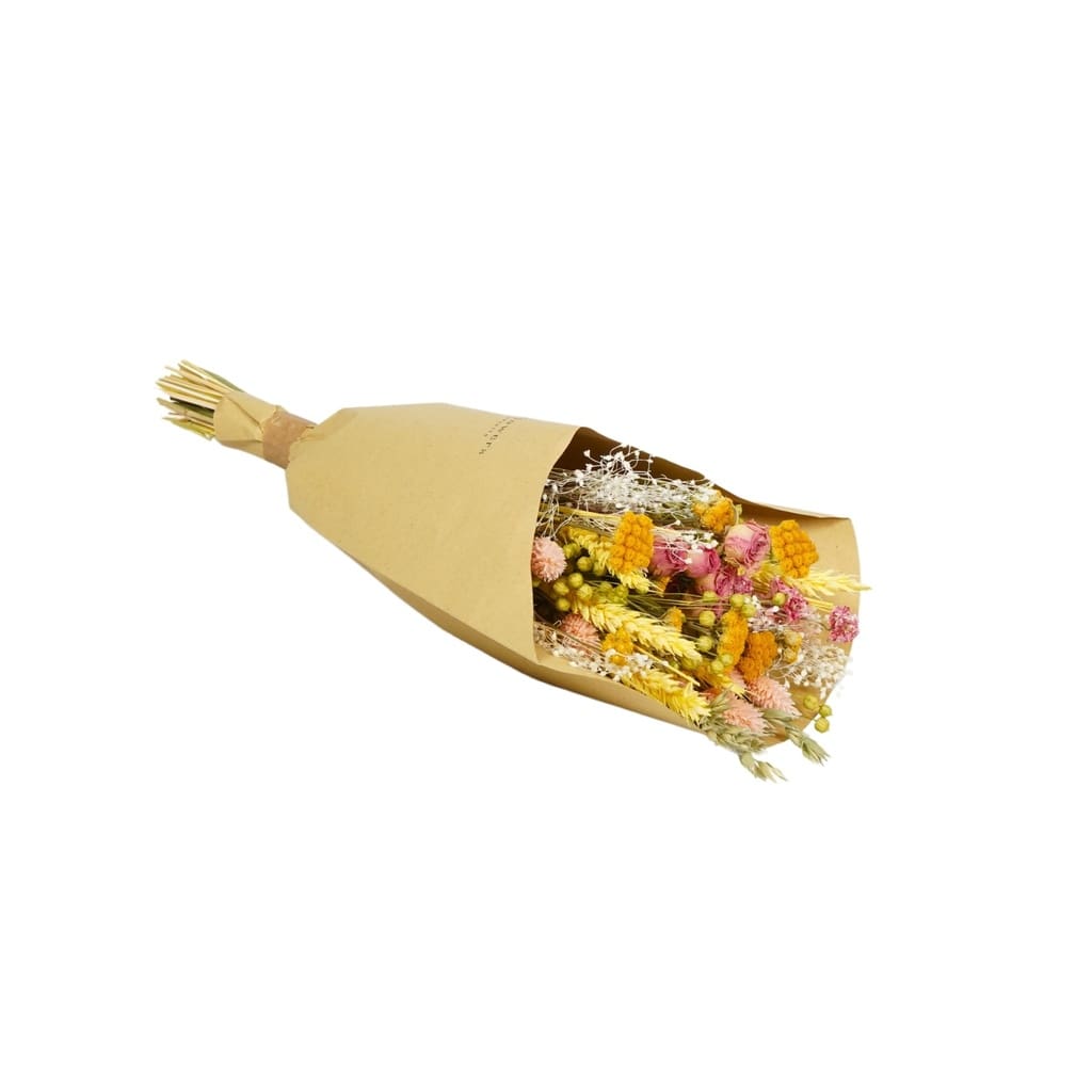 Bouquet of flowers wrapped in brown paper on a white background