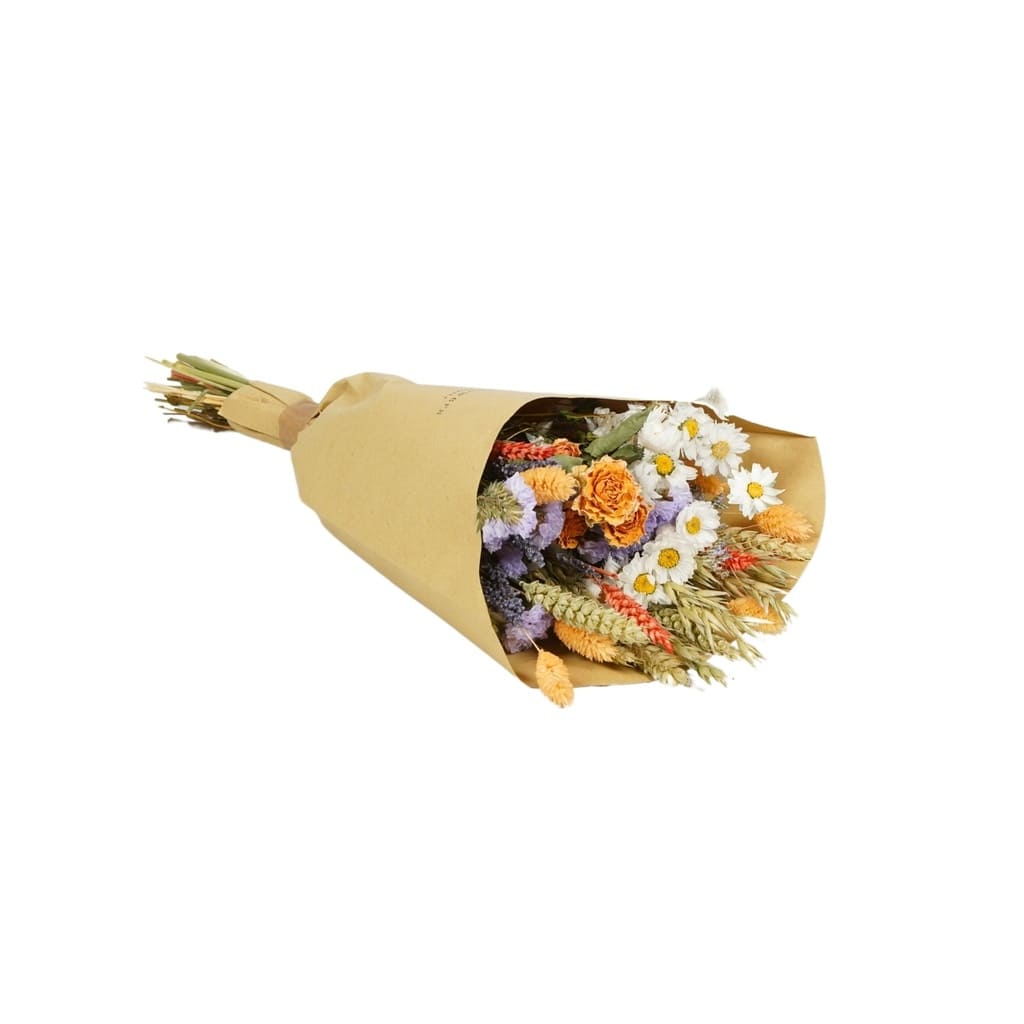 Bouquet of flowers wrapped in brown paper on a white background