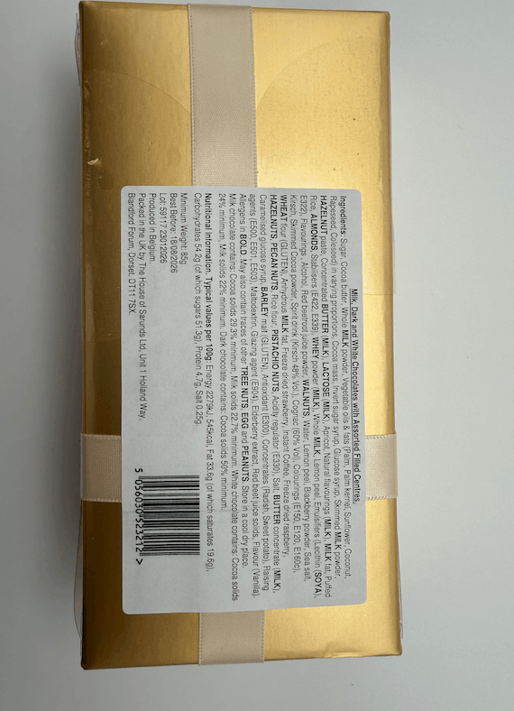 Back of Belgian chocolates assortment gift box showing ingredients label and barcode